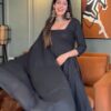 Front view of elegant black Schiffli suit set with square neckline