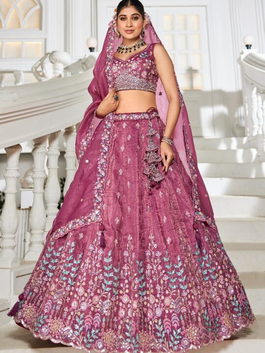 Front view of embroidered tissue lehenga choli with dupatta