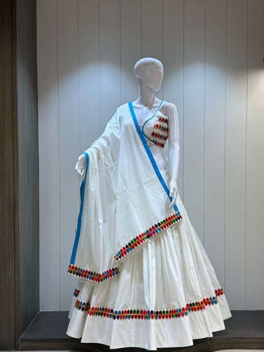 Cotton chaniya choli with fancy spaghetti blouse featuring vintage work and mirror lace dupatta