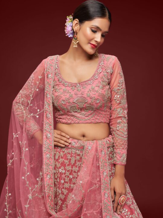 Close-up of Intricate Zari and Dori Embroidery on Coral Net Bridal Lehenga