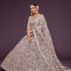 Lilac bridal lehenga choli with intricate embroidery