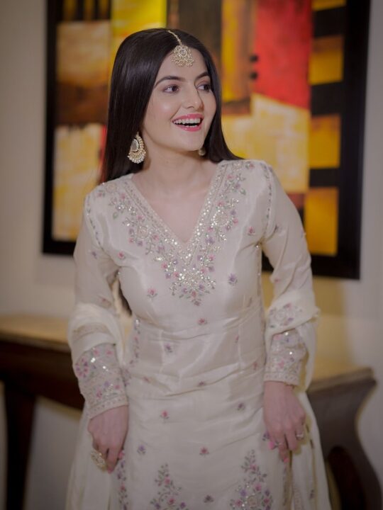 Back view of fancy embroidered kurti set with sequin work
