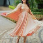 Woman wearing Chinnon Anarkali suit set in silk with embroidery – Pramukhmart