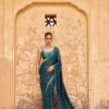 Bollywood sequin saree in georgette with embroidered lace and latkan border
