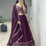 Traditional embroidered georgette lehenga set for women by Pramukhmart – festive wear with tassels and dupatta