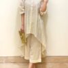 Front view of festive kurta palazzo set in cotton lurex with golden thread work