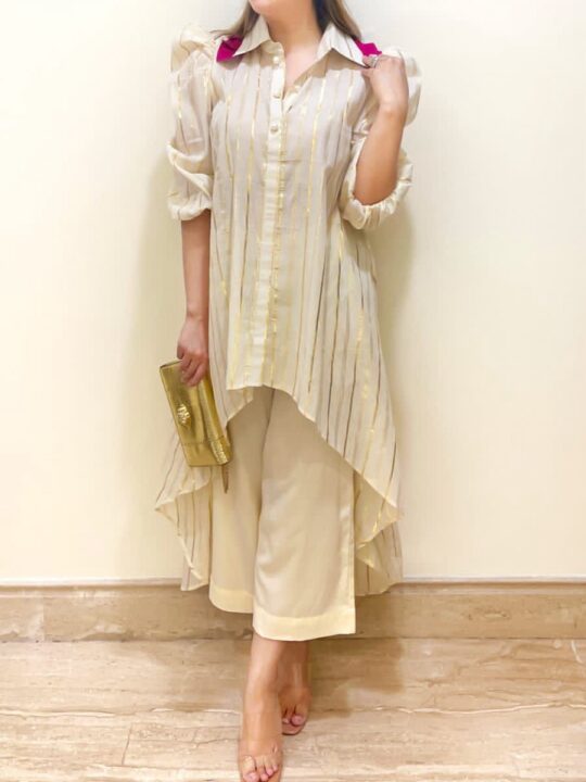 Front view of festive kurta palazzo set in cotton lurex with golden thread work