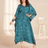 Woman wearing long printed kaftan in soft French crape with adjustable belt