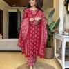 Woman wearing Pramukhmart cotton kurti set with embroidered neckline and block print