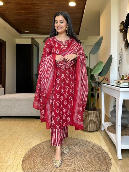 Woman wearing Pramukhmart cotton kurti set with embroidered neckline and block print