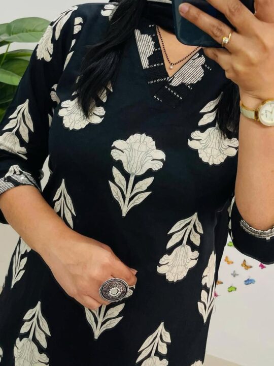 Close-up of handwork neck detail on cotton kurti