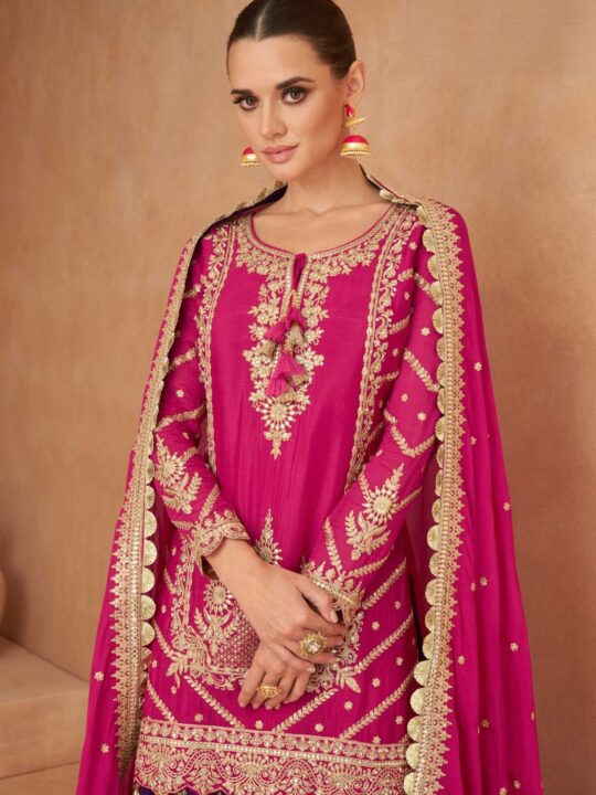 Detailed embroidery on round neckline and cuffs