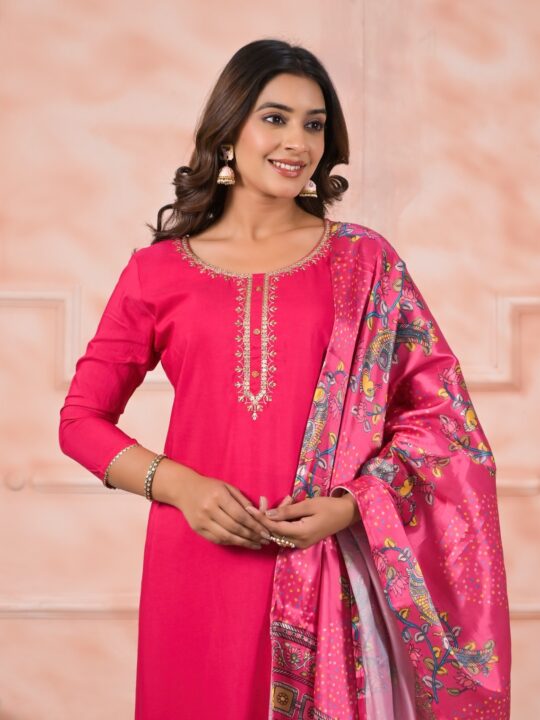 Close-up of gold thread work on neckline