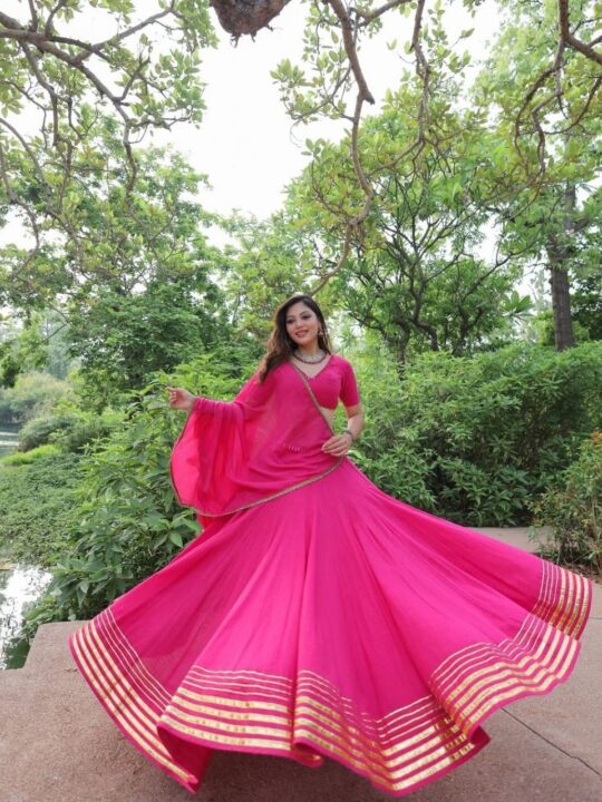 Hot pink lehenga choli with dupatta and gold lace
