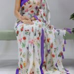 Floral linen saree with tassels front view