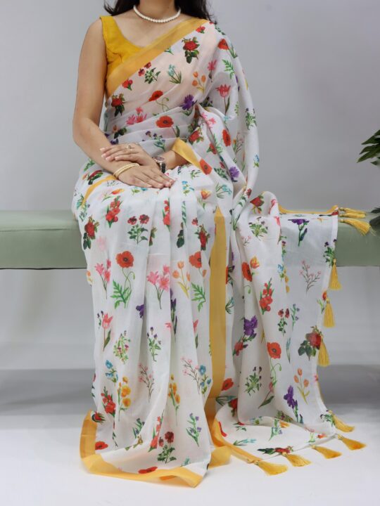 Elegant linen saree flat lay with accessories